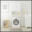Armoire de rangement au-dessus de la toilette