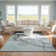 Mikilah Authentic Hand-Tufted Handcrafted Light Blue & Gray Blue High-Low Floral Wool Area Rug