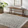 Aryas Checkered Machine Woven Polyester Area Rug in Black/Cream