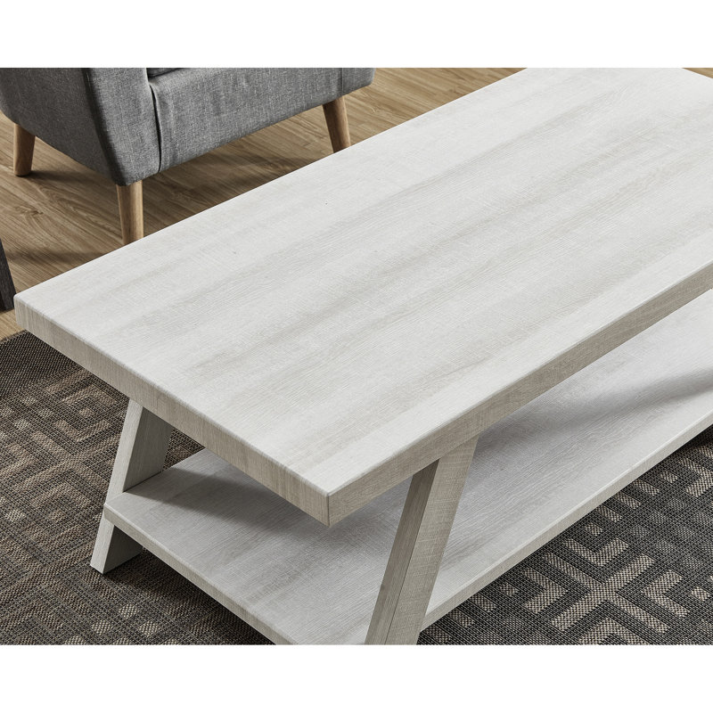 Table basse blanche avec plateau en placage de bois franc