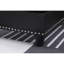 Canapé modulaire en L noir avec rangement, porte-gobelets et repose-pieds assorti noir Fux