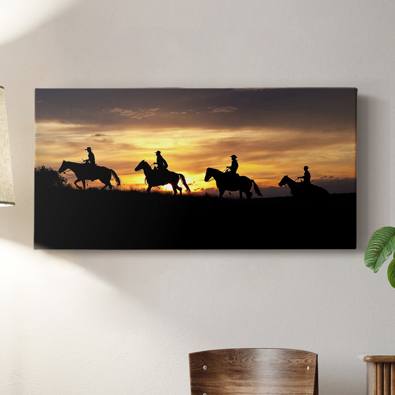 Sunset Cowboys - Toile tendue avec châssis - Prêt à accrocher, H 24 po x l 48 po