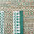 Janellie Natural Fiber Hand Woven Jute/Wool Solid Color Rug in Brown/Green-1453969274