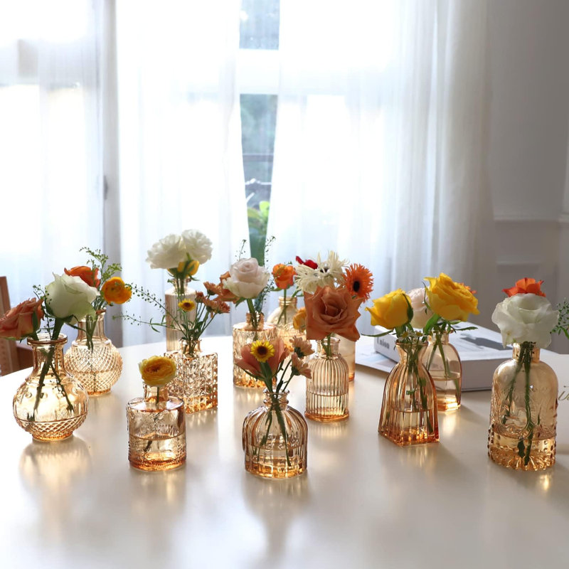 Ensemble de 22 mini vases en verre