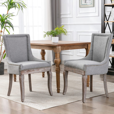 Chaise de salle à manger Ultra Side 2 pièces - Tissu gris avec pieds en bois massif et clou en bronze élégant