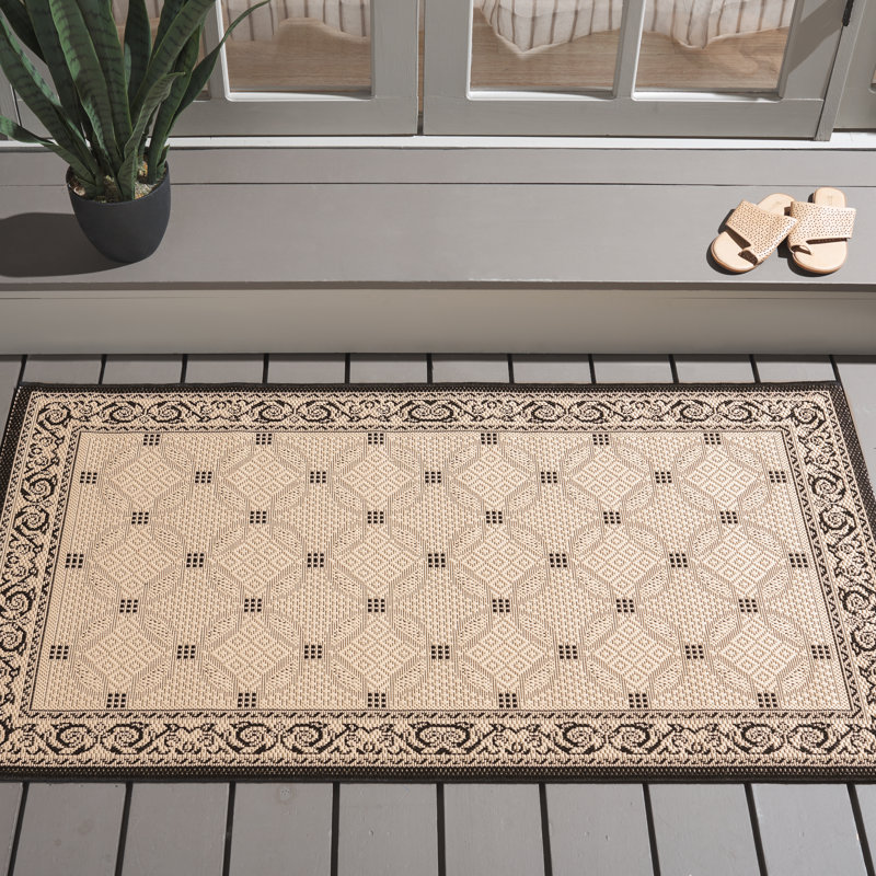 Tapis intérieur / extérieur ivoire / noir Arneshia, Rectangle 2 pi 7 po x 5 pi