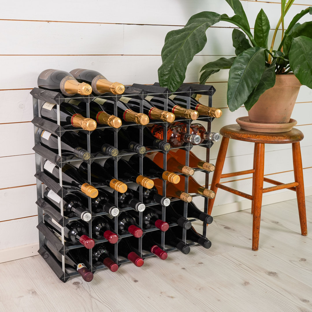 Wine rack for 42 bottles. Made of Swedish pine wood and produced in Sweden. The rack is delivered flat-packed.