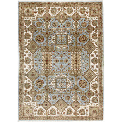 Tapis bleu et ivoire de haute qualité noué à la main