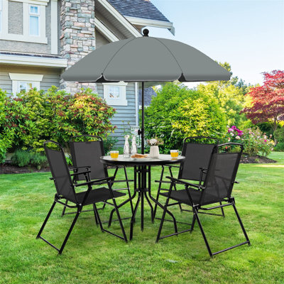 Camonte 4 - Person Patio Dining Set with Round Table