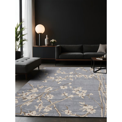 Tapis bleu soyeux et moelleux