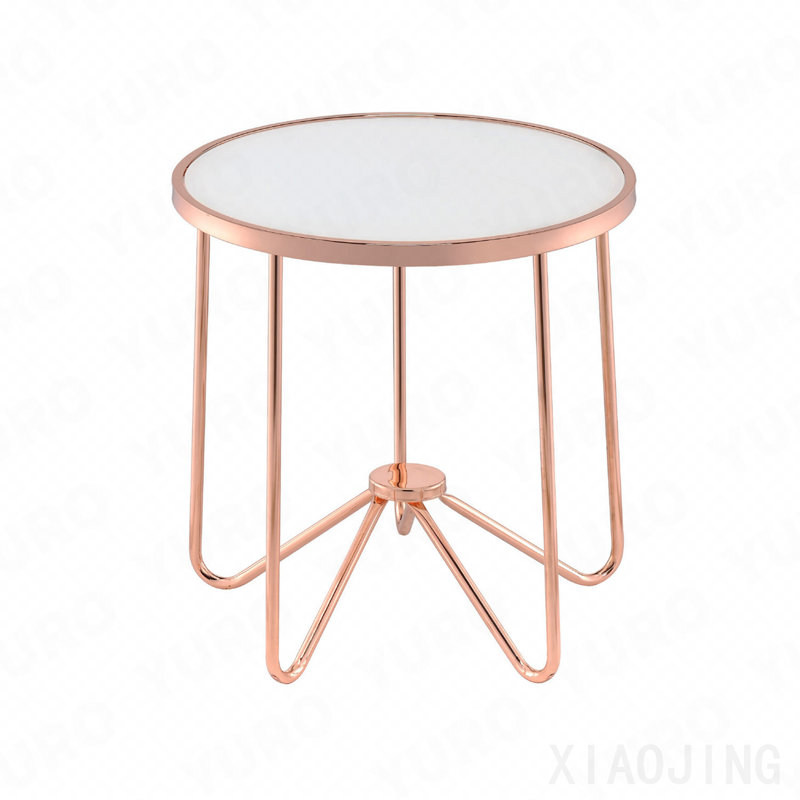 Table ronde blanche avec plateau en verre givré et finition or rose