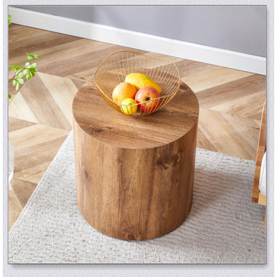 The cylindrical table with its patterned design can be easily integrated