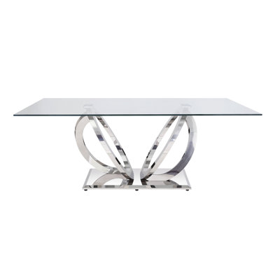 Table de salle à manger élégante en verre transparent et miroir argenté avec plateau brillant