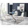 Lenworth Chrome and Glass Rectangular Dining Table Set with 4 Luxury Faux Leather Chairs