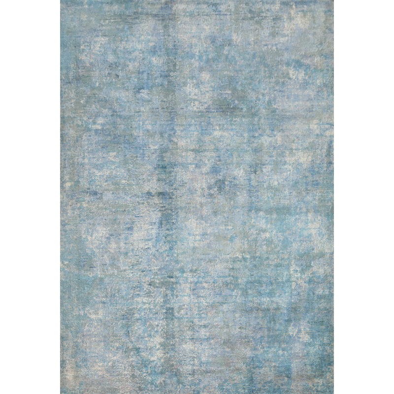Tapis bleu à aspect délavé abstrait 9 x 11
