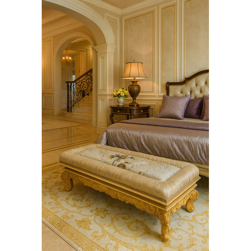Banc / repose-pieds rembourré avec cadre sculpté