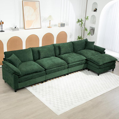 Canapé modulaire rembourré en L avec repose-pieds