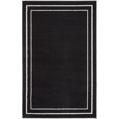 Aubreanna Abstract Machine Woven Chenille Indoor/Outdoor Area Rug in Black