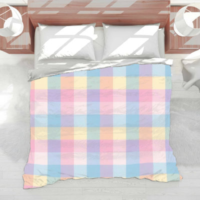 Couette à motif à carreaux pastel