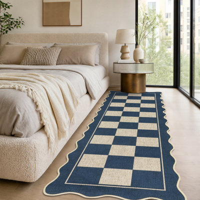Tapis festonné à carreaux pour l'extérieur 