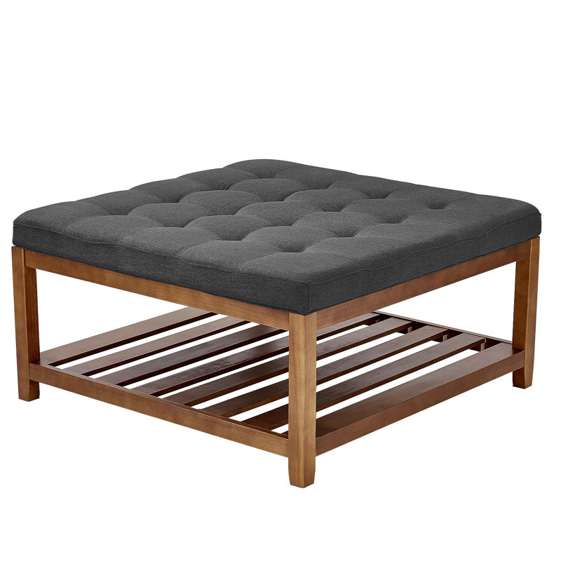 Grande table basse avec repose-pieds carré rembourré en lin capitonné