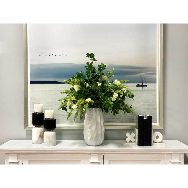 Budding Hydrangeas and Boxwoods Arranged in a Ceramic Vase