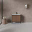 Meuble-lavabo sur pied ou mural avec lavabo et bonde escamotable, pieds réglables en hauteur, portes à fermeture douce et tablette réglable, noyer et noir