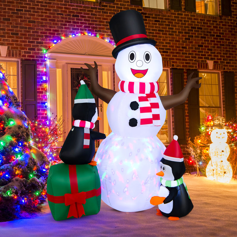 Bonhomme de neige gonflable de Noël et pingouins