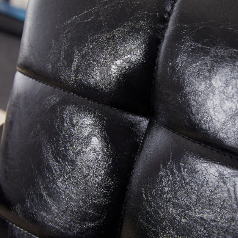 Fauteuil d'appoint en cuir avec pieds robustes en bois