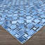 Tapis bleu à motif géométrique-847203144