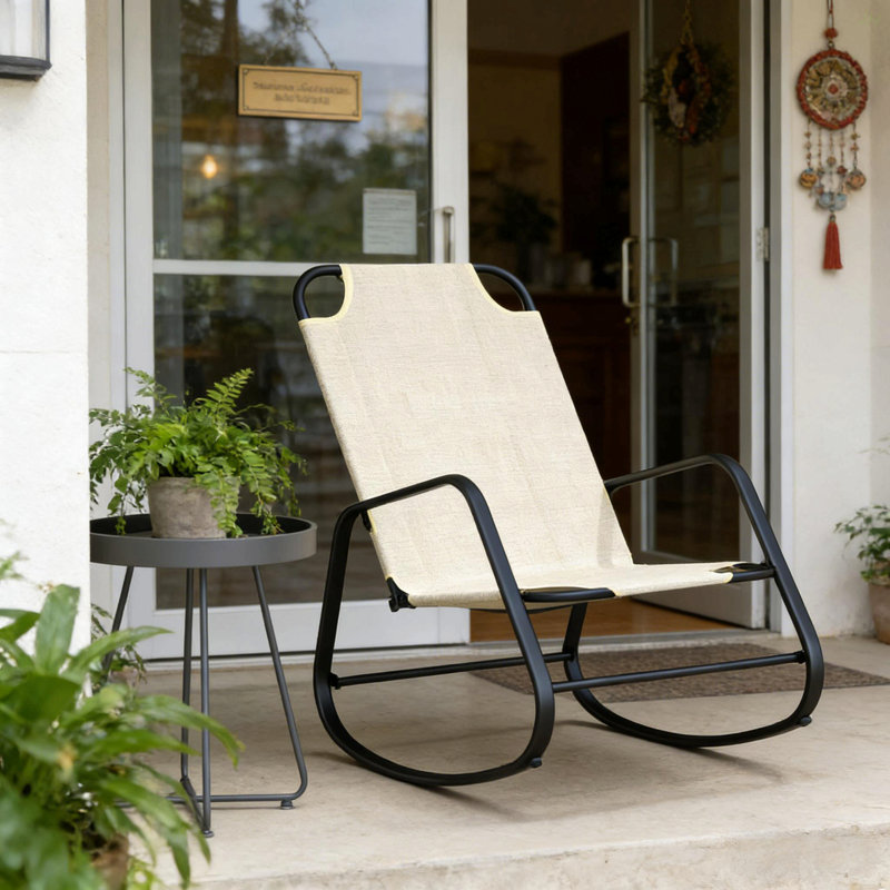 Chaise berçante d'extérieur confortable avec dossier haut, structure en acier robuste et toile résistante aux intempéries pour la détente