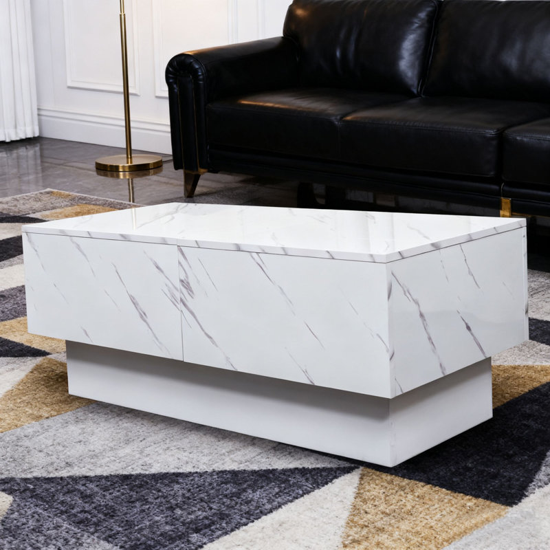 Table basse moderne en faux marbre blanc au design épuré