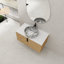 Meuble-lavabo de salle de bain avec lavabo en céramique et dalle de pierre artificielle