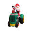 Décoration gonflable de Noël en forme de père Noël sur un tracteur