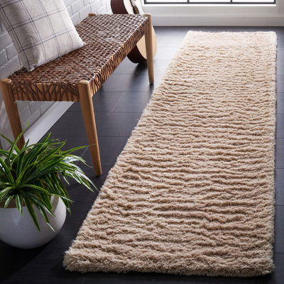 Elizzie Hand Tufted Wool/Cotton Solid Color Rug in Beige