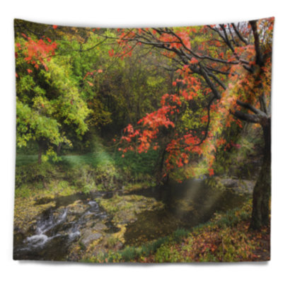 Paysage avec des arbres aux couleurs vives