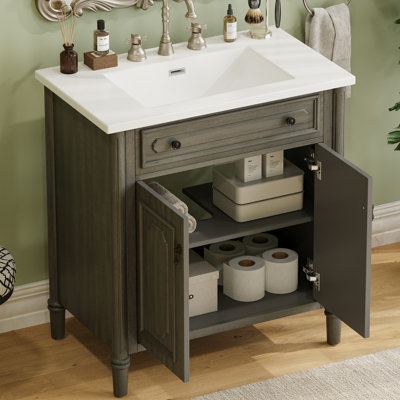 Meuble-lavabo de 31 pouces avec lavabo en céramique, portes à fermeture en douceur, tablettes réglables, profil incurvé, pieds en bois d'hévéa et trou de robinet pré-percé de style rétro au fini gris antique de 31 po, fonction
