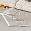 Élégante table basse rectangulaire en verre transparent avec pieds en métal pour un salon moderne, durable et facile à nettoyer-170364592-170364593