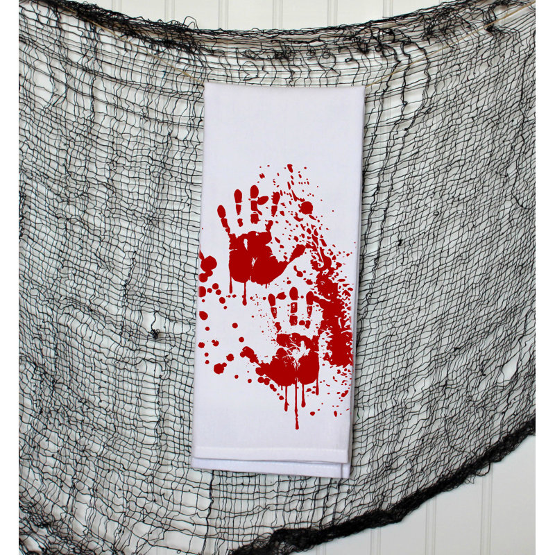 Serviette de cuisine sanglante mains