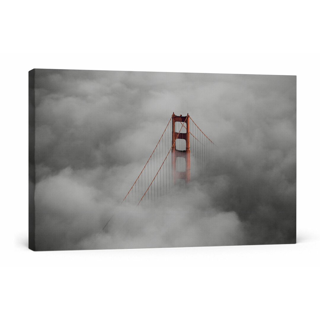 Leinwandbild Golden Gate Bridge über den Wolken