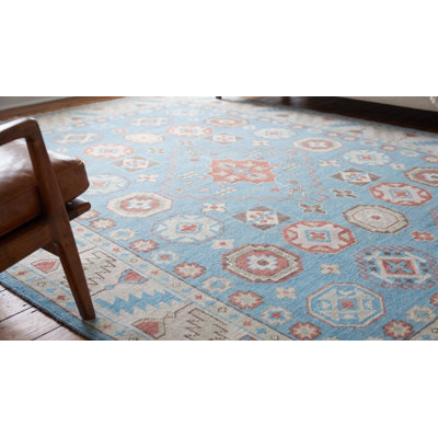 Tapis traditionnel en laine noué à la main bleu clair Keeley