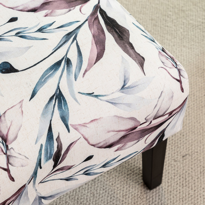 Fauteuil en tissu imprimé avec motif floral mauve - Espace de vie moderne, assise confortable et sans accoudoirs