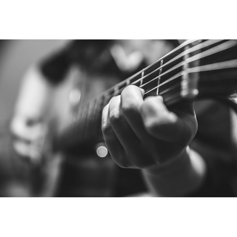 Musician Playing Guitar by Coffeekai - Wrapped Canvas Print, 30cm H x 46cm W x 3.8cm D