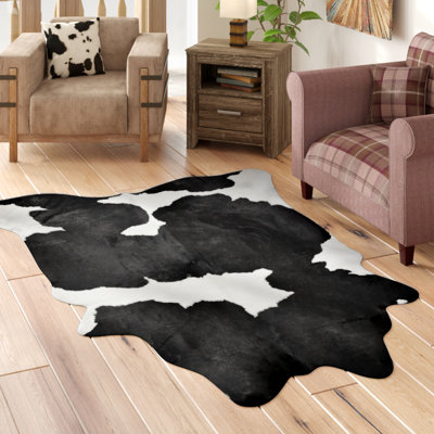 Tapis contemporain en peau de vache noir 17