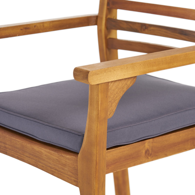 Ensemble repas d'extérieur ovale en bois d'acacia 6 personnes avec coussins Tinnin, Teck