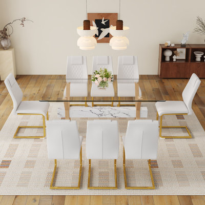 Ensemble de table de salle à manger élégant avec verre trempé et cuir d'unité centrale - parfait pour les maisons modernes