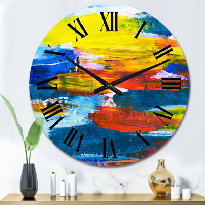 Horloge murale moderne jaune, rouge et bleu
