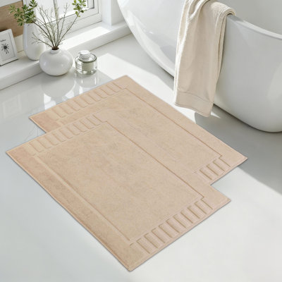 Tapis de bain 100% coton à bordure géométrique 