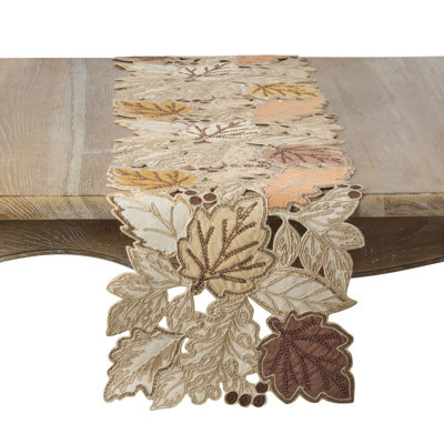 Chemin de table brodé à feuilles d'automne
