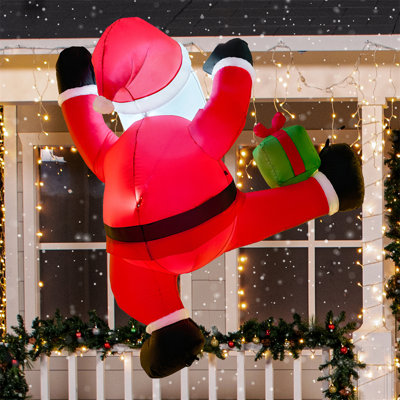 6ft Tall Christmas Inflatable Climbing Santa with Gift Box